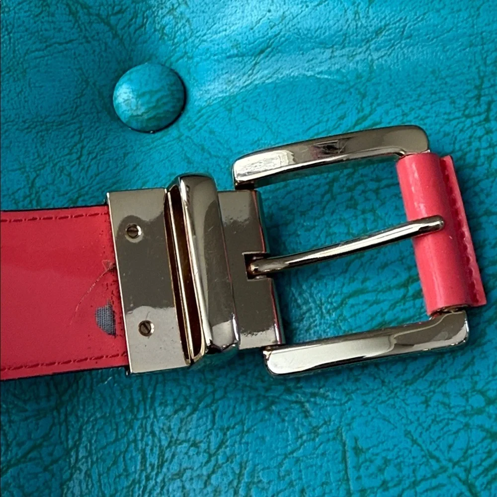 Reversible Michael Kors MK logo belt with bright shiny coral side - see flaw
